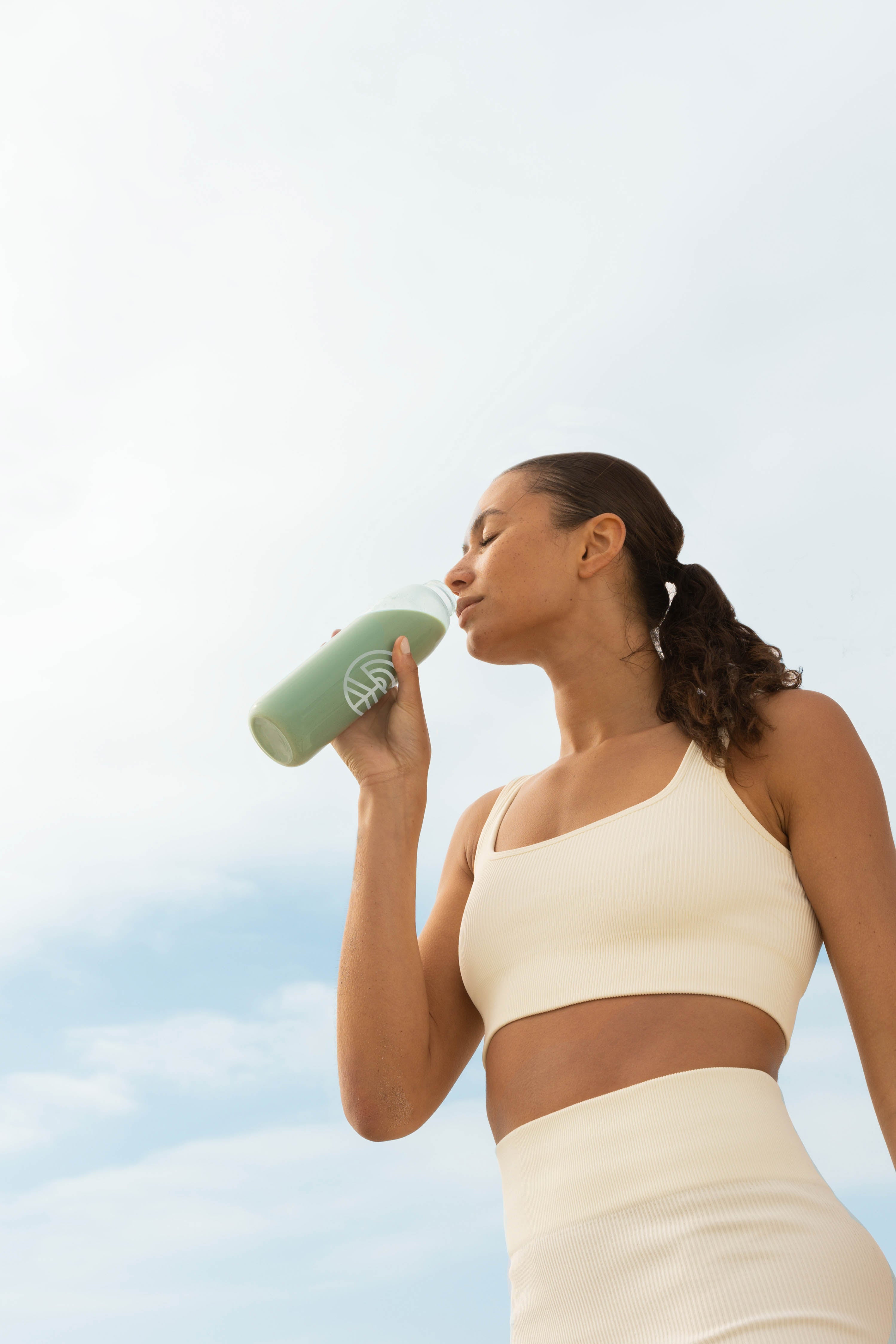 Woman Drinking Plant Protein
