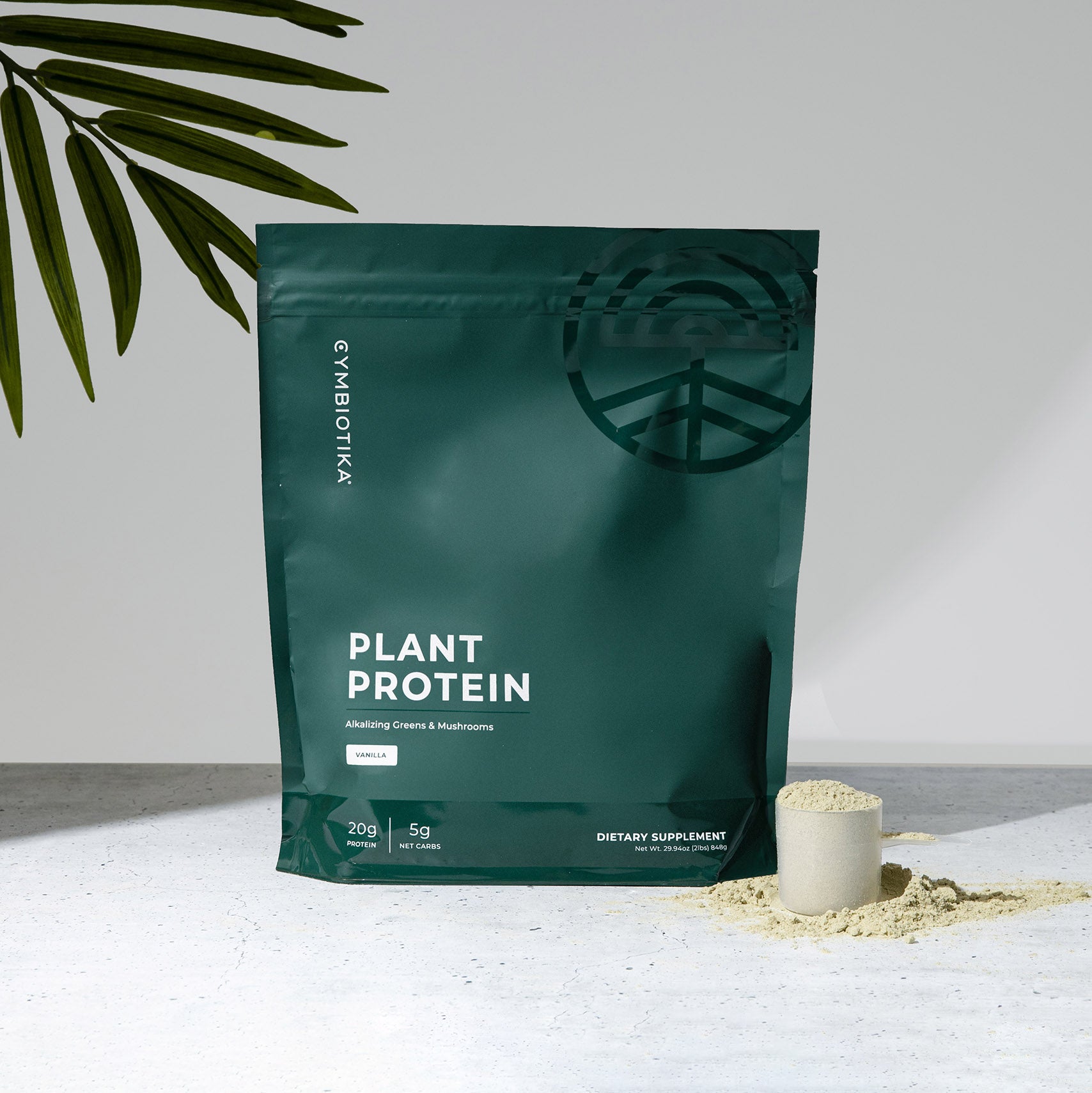 Plant Protein Bag Next to Scoop of Protein