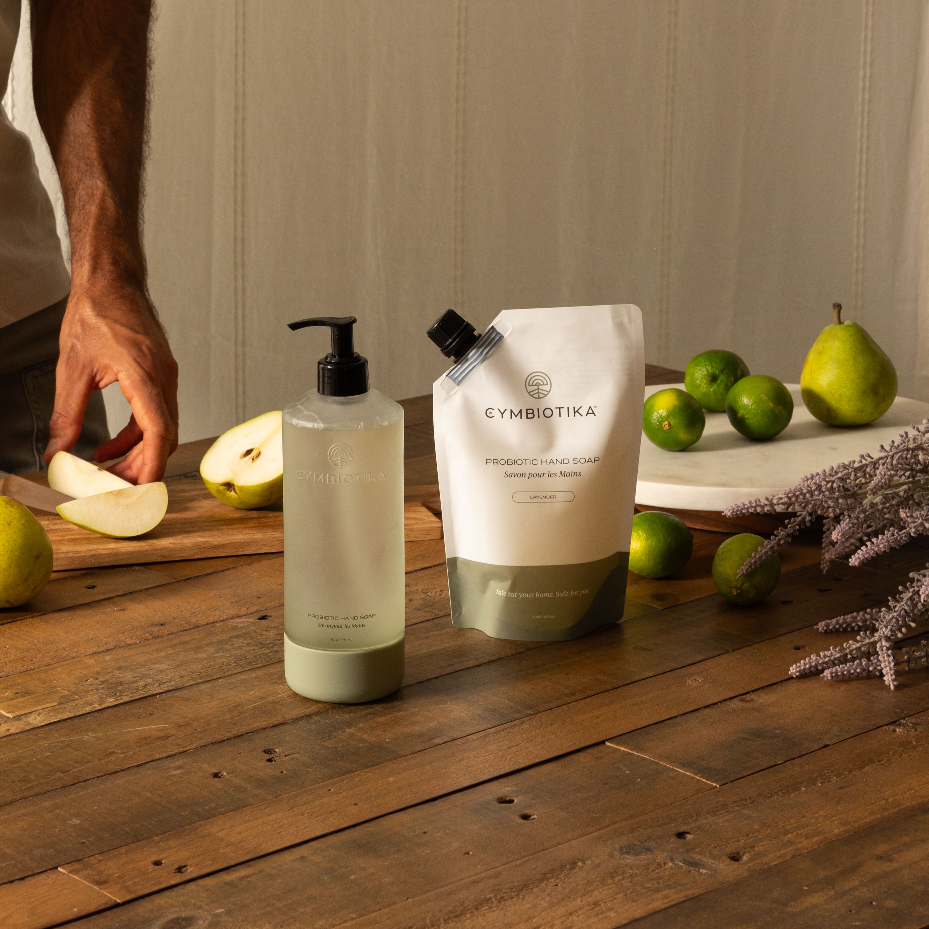 Probiotic Hand Soap Kit Next to Pear Being Cut